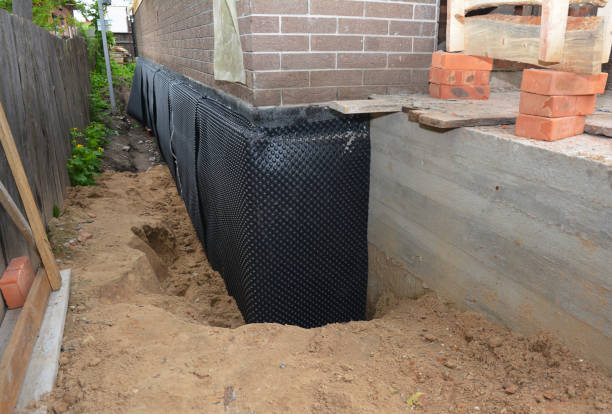 Happy homeowners after waterproofing job in Wadsworth